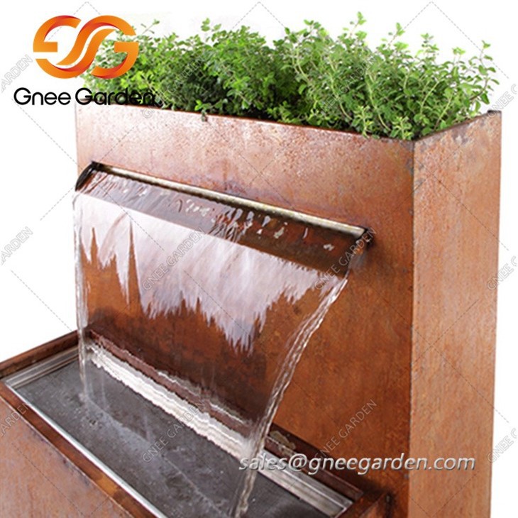 corten steel sphere water feature
